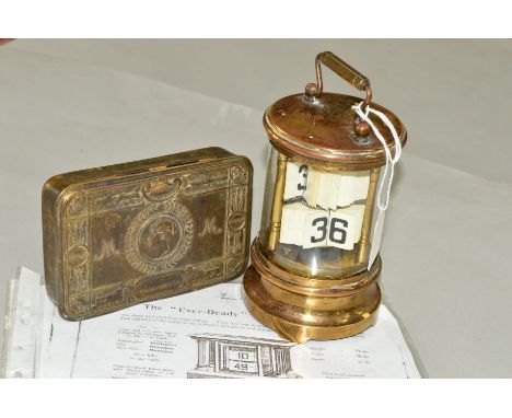 A CHRONOS TICKET CLOCK, unmarked, possibly Ever Ready, approximate height to top of handle 16cm, together with photocopy of a