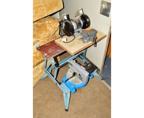A FOLDING WORKBENCH, a bench grinder, vice and Combi mitre saw
