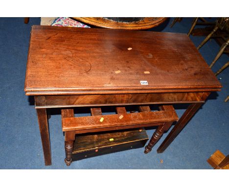 AN EARLY 19TH CENTURY MAHOGANY FOLD OVER TEA TABLE, an Edwardian mahogany luggage rack, an Edwardian piano stool, a circular 