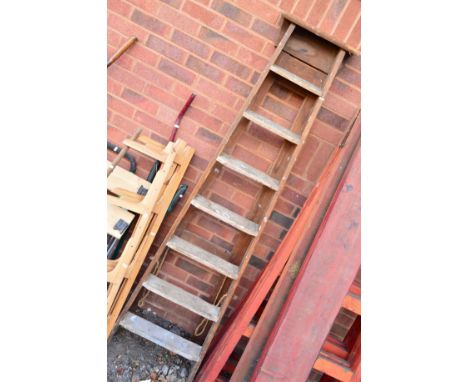 A SET OF VINTAGE WOODEN STEP LADDERS