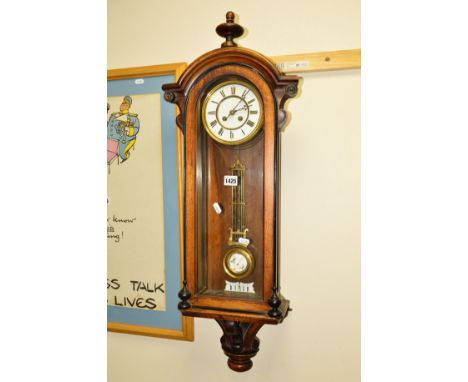 A VICTORIAN MAHOGANY WALL CLOCK, eight day movement, circular dial with Roman numerals, approximate height 87cm