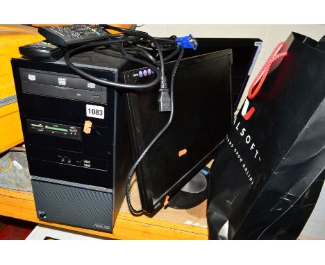 AN ASUS COMPUTER TOWER, two TFT screens, keyboard, mouse and speaker