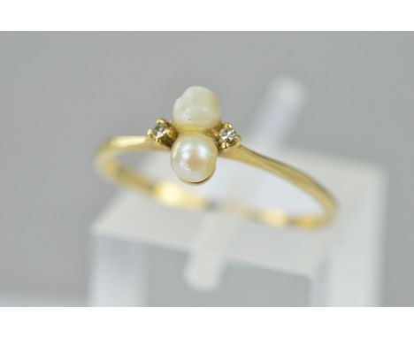 A MID TO LATE 20TH CENTURY PEARL AND DIAMOND DAINTY DRESS RING, ring size N, hallmarked 9ct gold, London, approximate gross w