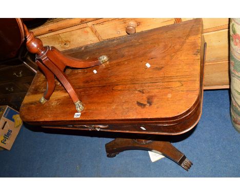 A REGENCY ROSEWOOD FOLD OVER CARD TABLE, baize interior canted corner on a cylindrical support and scrolled feet (sd)
