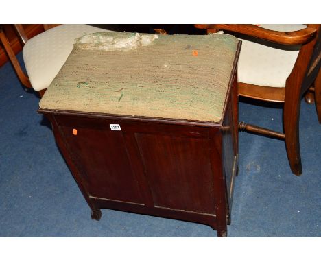 AN EDWARDIAN MAHOGAN PIANO STOOL with double fall front sides (distressed)