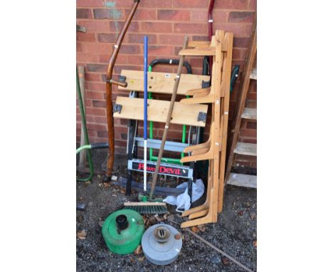 A FOLDING WORK BENCH, lawn aerator, three pine shelf brackets and garden tools