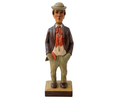 Black Forest carved wooden whistling automaton by Karl Griesbaum with original key.