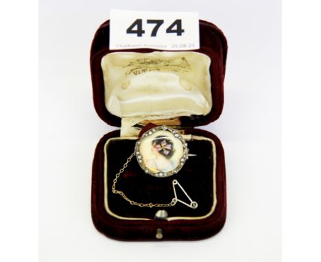 A very pretty c. 1920's 935 silver and seed pearl mounted portrait miniature brooch with box, Dia. 2.3cm.