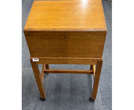 A 1930's light oak work box, 45 x 31 x 80cm.