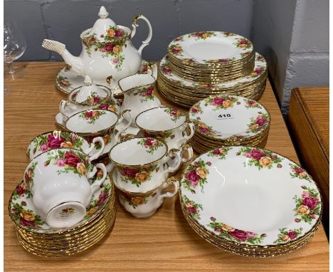 An extensive Royak Albert 'Old Country Roses' tea and dinner set mostly 8 settings except soup bowls (4). Mixed but predomina