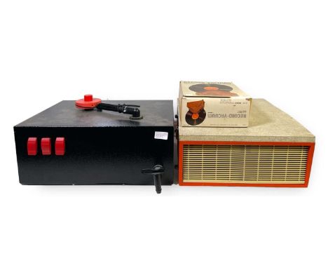 A Westmister Fidelity record player, a record cleaning machine and a Ronco record vacuum.