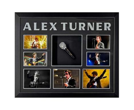 A professionally mounted, framed and glazed display to include a microphone signed in silver ink by Alex Turner of Arctic Mon