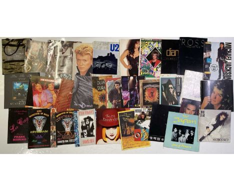 A collection of 28 concert programmes by artists such as Adam and the Ants, Slash, Duran Duran, The Damned, Siouxsie and the 