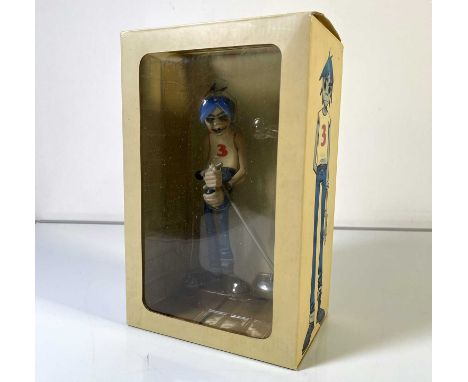 A 2006 Gorillaz ''2-D' Kid Robot doll in original box, box signed in marker pen by Damon Albarn and Jamie Hewlett.