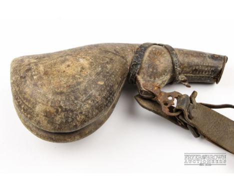 An antique camel scrotum powder flask 