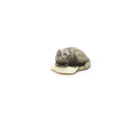 An ivory netsuke of a rat and bean podBy Masatami, Edo period (1615-1868) or Meiji era (1868-1912), 19th centuryThe rat with 