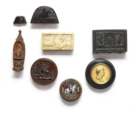 A collection of seven Napoleon related snuff boxesIncluding a carved coquilla nut example in the form of a man o' war, two gr