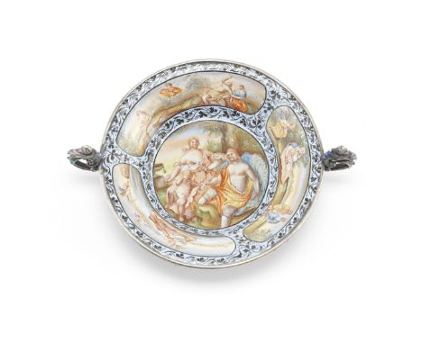 A late 19th/early 20th century Viennese silver and enamel twin handled dishof shallow tapering circular form, with scrolling 