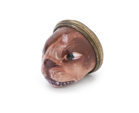 A tiny South Staffordshire enamel dog's head bonbonnière, circa 1780Naturalistically modelled, its fur picked out in shades o