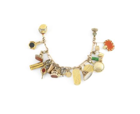 A 9ct gold watch chain with various seals and novelty attachmentschain hallmarked Chester 1887, stamped 9ct (.375)  A trombon