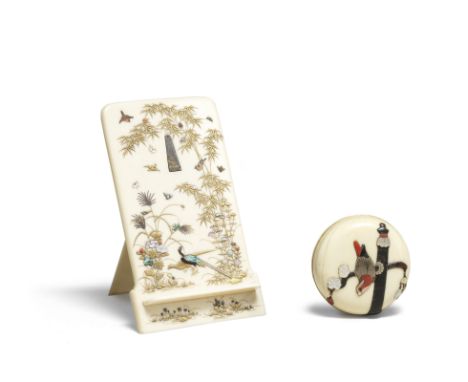 A shibayama-inlaid ivory stand and an ivory manju netsukeMeiji era (1868-1912), late 19th/early 20th centuryThe first a stand