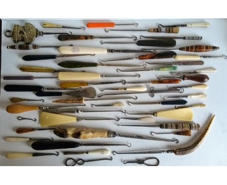An assortment of forty late 19th century / early 20th century button hooks and shoe horns comprising: 7-horn, 2-horn, 1-anima
