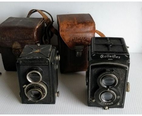 A 1932 Franke & Heidecke Braunschweig Rolleiflex Compur camera, and a 1930s Voigtlander Brilliant vintage camera -COMPUR, bot