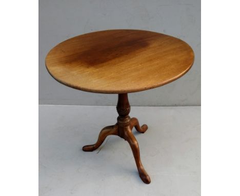 A Georgian mahogany circular flip-top table on a tripod base, 70H x 75 diameter x 24D cm 