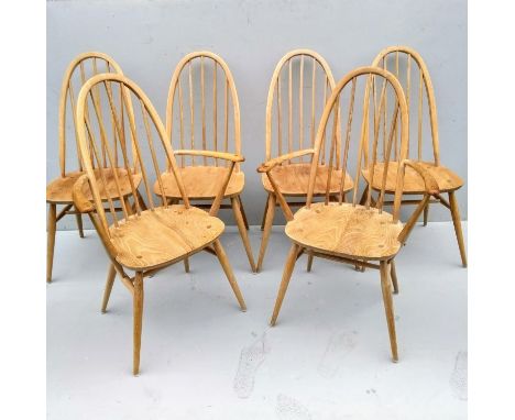 A set of four Ercol Windsor Quaker hoop-back dining chairs in light elm with two matching carvers (6) 