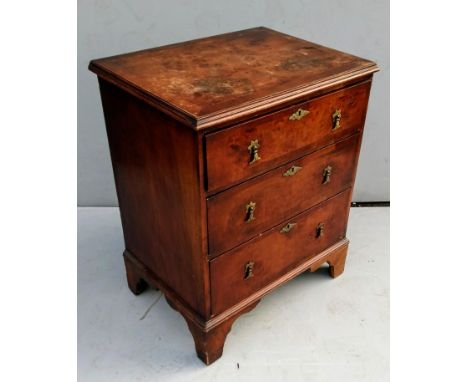 A Queen Anne-style walnut smaller chest of three drawers with tear-drop brass drop handles raised on bracket feet, 75 x 62 x 