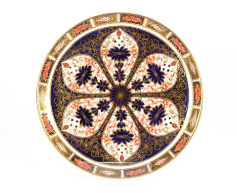 A Royal Crown Derby Imari pattern tea set, comprising cups, saucers, side plates, serving plates, sugar bowl, cream jug, and 