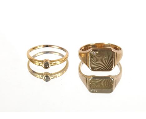 A gent's 9ct gold and diamond set ring, size R/S, 5gms and a yellow metal and diamond set ring, ring size O, 2.2gms&nbsp;