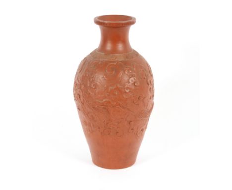 A Chinese red clay baluster vase, having raised dragon and foliate decoration, seal mark to base, 33cm high&nbsp; 