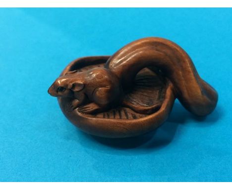 Netsuke; mouse on a mushroom