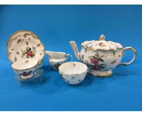 A Royal Crown Derby 'Derby Days' tea service comprising; teapot, sugar bowl, cream jug and six side plates and six cups and s