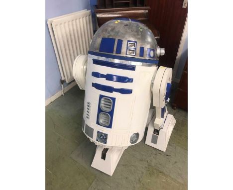 A life size model of R2 D2 robot from the Star Wars franchise