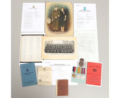 A collection of documents and other items including: Soldier's Service and Pay Book belonging to Andrew Letters Newman born 2
