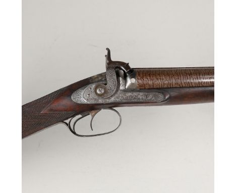 With twin 72cm damascus barrels, approximately 11 bore, indistinctly marked to the central rib, muzzle loading with ramrod be
