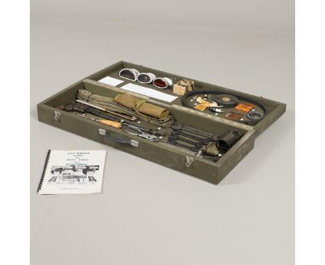 An extensive tool kit for a 1942 Ford Jeep and a similar parts kit, some 34 parts or tools to include a hub puller, various s