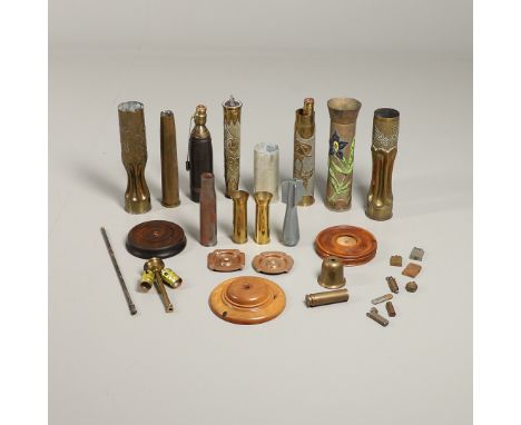 A collection of trench art to include two similar shells, 34.5cm tall, with ribbed center's and decorated for Verdun with a c