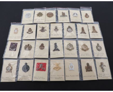 A collection of cap and other badges to include examples for the Royal Army Service Corps, Medical Corps, Ordnance Corps, Mil