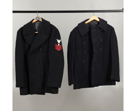 A dark blue navy double breasted 'pea' coat with six large buttons with fouled anchors, with internal label 'Coat, Man's Wool