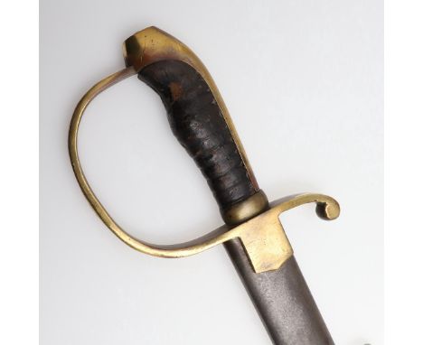 With an 85cm curved and fullered blade with pointed and end and sharpened edge, with brass hilt and langets with pointed edge