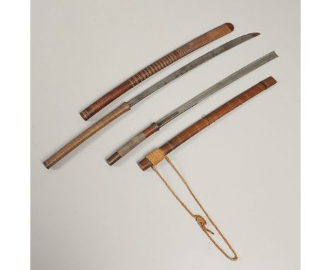 A Burmese sword with a 59cm shaped blade with sharpened edge in a tapering grip with finely woven surface, the two part woode