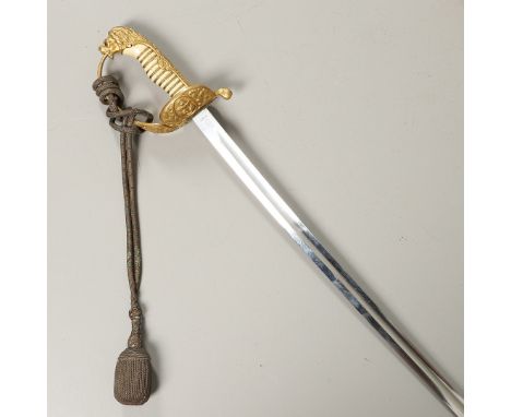 With an 83cm curved, pointed blade with long shallow fuller, marked with a knight's helmet and W.K.C. With a folding gilt gua