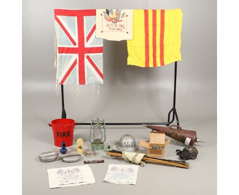 A collection of Second World War Home Front items to include a stirrup pump, fire bucket, conical Minimaxfire extinguisher, a