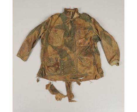 A Dennison half zip smock with four pocket front. Approximate size 90cm top to bottom and 70cm at lower edge. *CR In heavily 