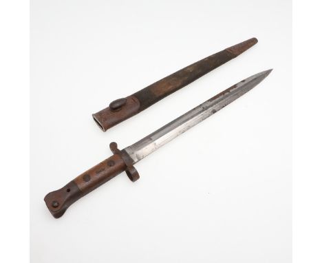 With a 30cm double edged pointed blade with various marks to the ricasso including a King's Crown above ER, a Government issu