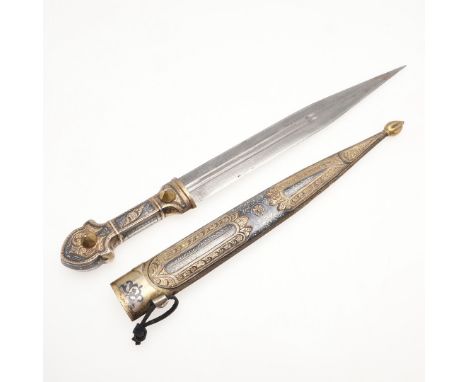 With a 26cm pointed double edged sharpened and pointed blade with central double fuller.The highly decorated handle and scabb