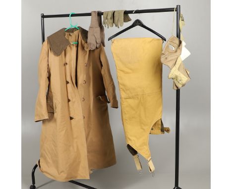 A large overcoat with quilted lining and blanket lining, with label Coat Sheepskin Lined Size No. 3 height 5ft 7ins to 5ft 10